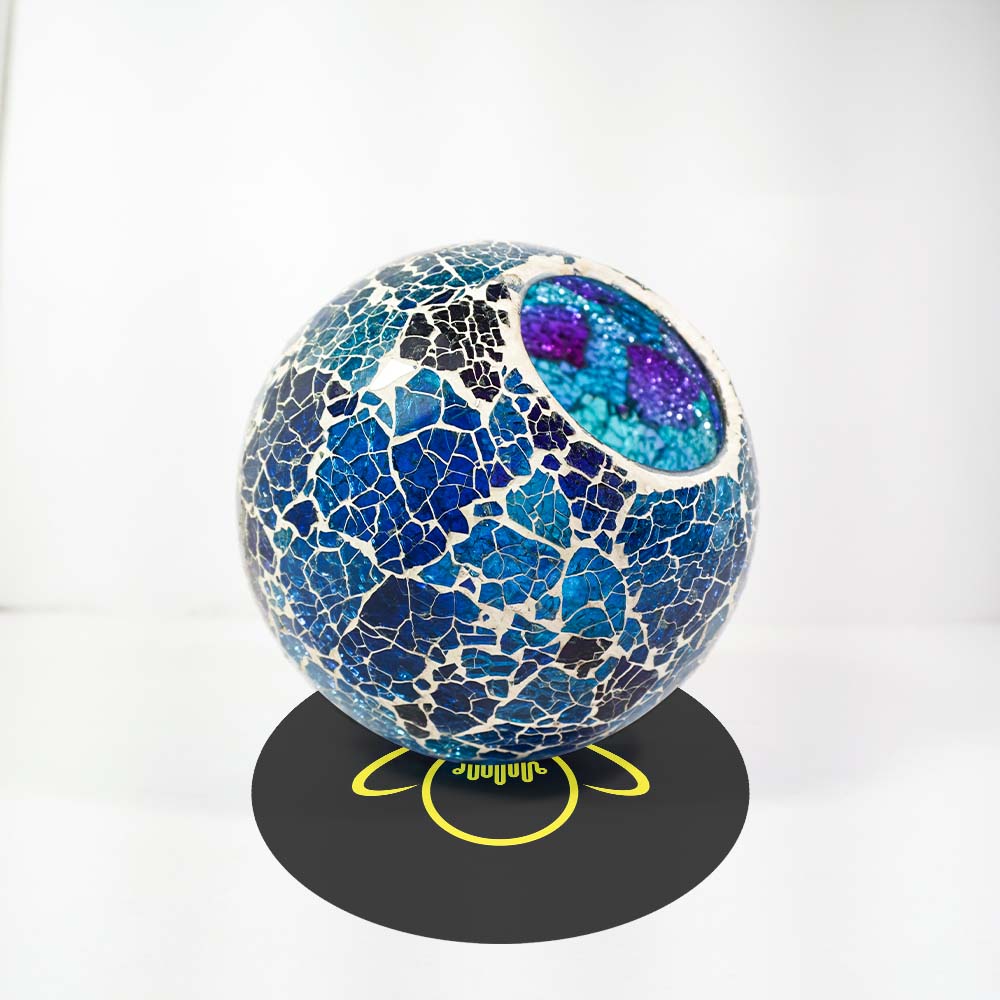Mosaic sphere with blue and purple patterns on a white background