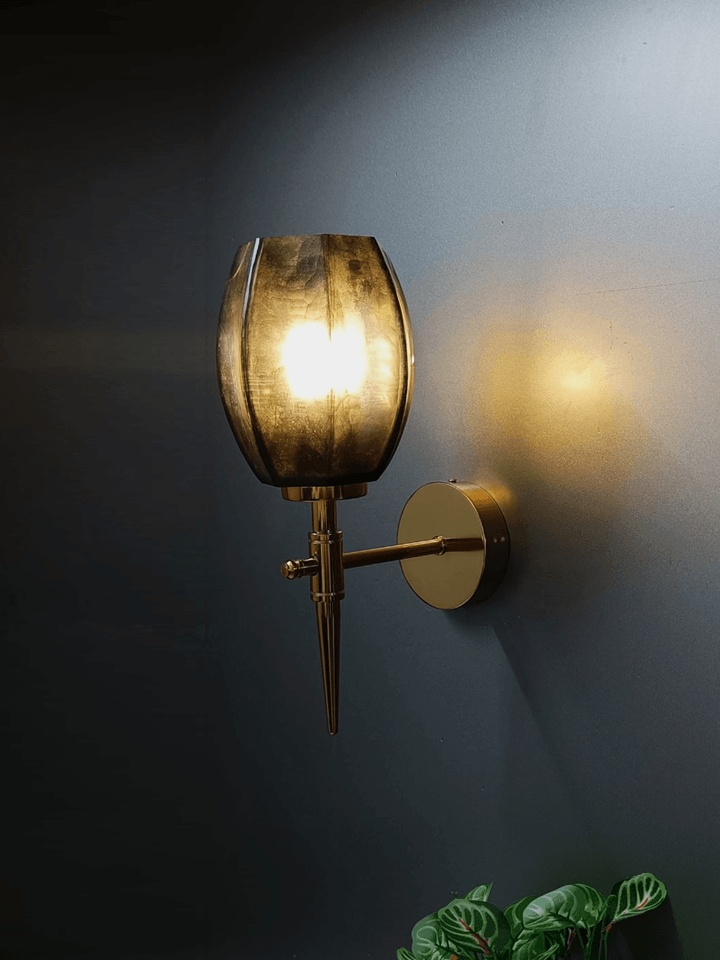 High-quality gold wall sconce for a sophisticated living space (India).