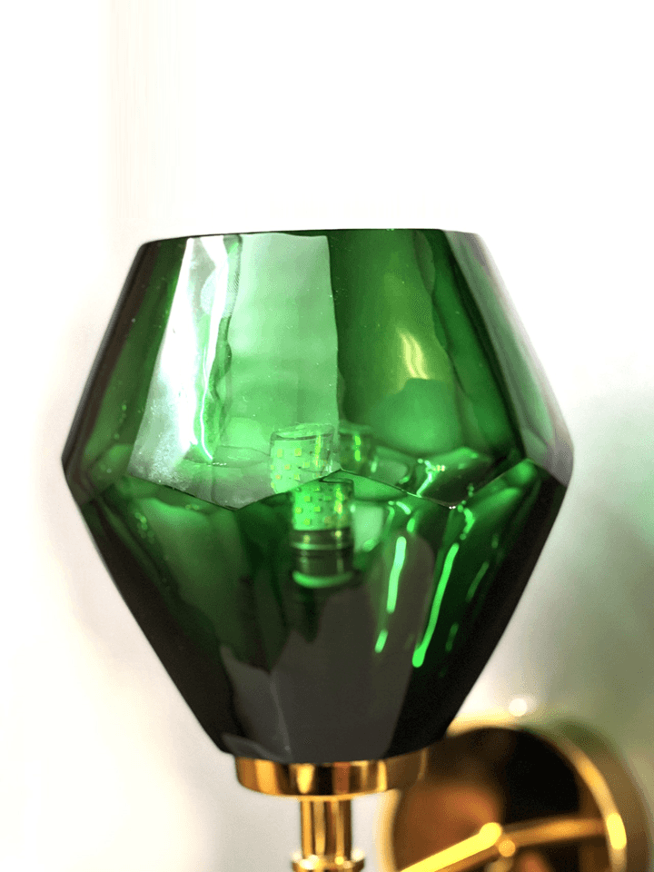 Green crystal wall light with a single turned-on bulb, highlighting its brightness. (Keywords: wall lights for home, green crystal wall light, E27 bulb)