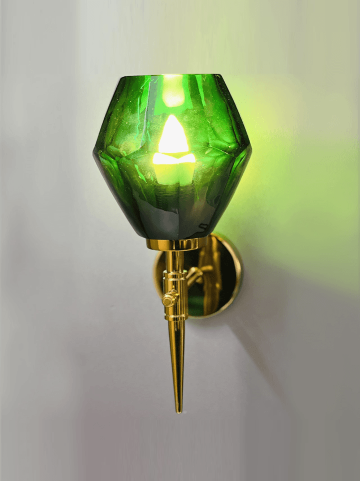 Modern living room featuring a gold PVD wall light with green crystal glass. (Keywords: wall lights for home, gold PVD wall light, modern living room)