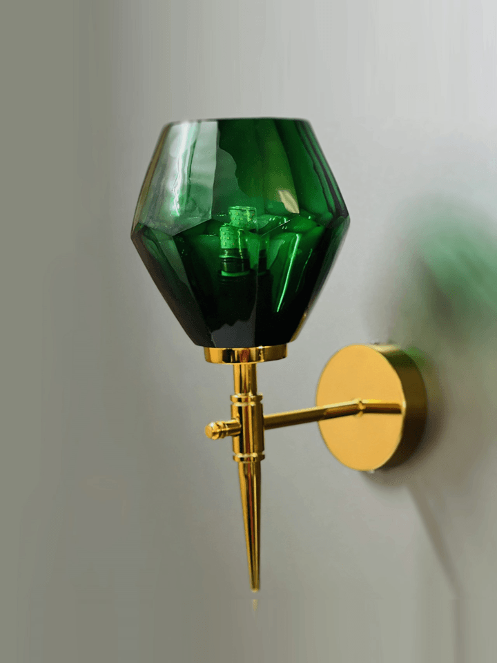 Green crystal wall light illuminating a hallway, creating a welcoming ambiance. (Keywords: wall lights for home, green crystal wall light, hallway lighting)