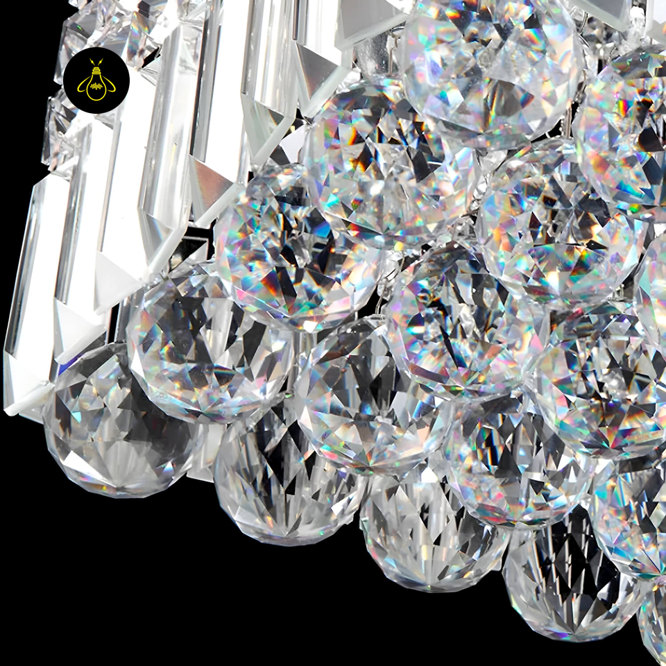 Clear crystal and stainless steel finish of Jagmag chandelier.