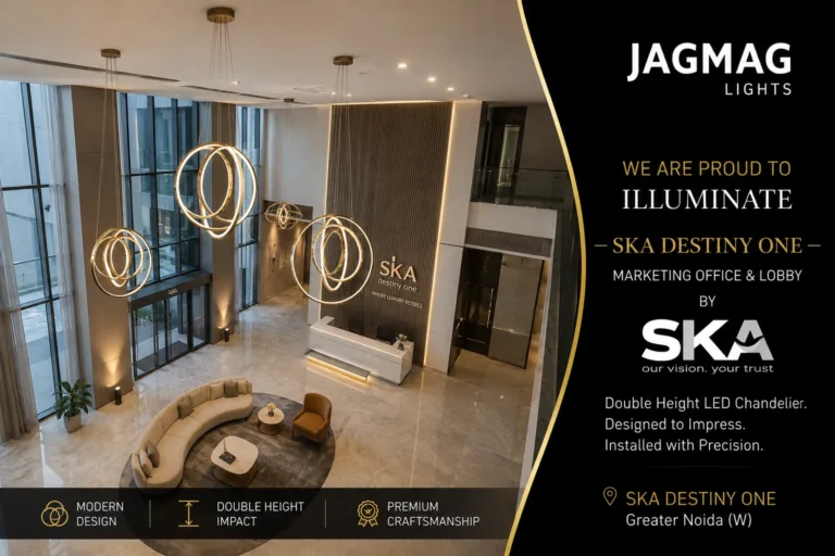 Double height LED chandelier with four gold rings being installed at the SKA Destiny One project