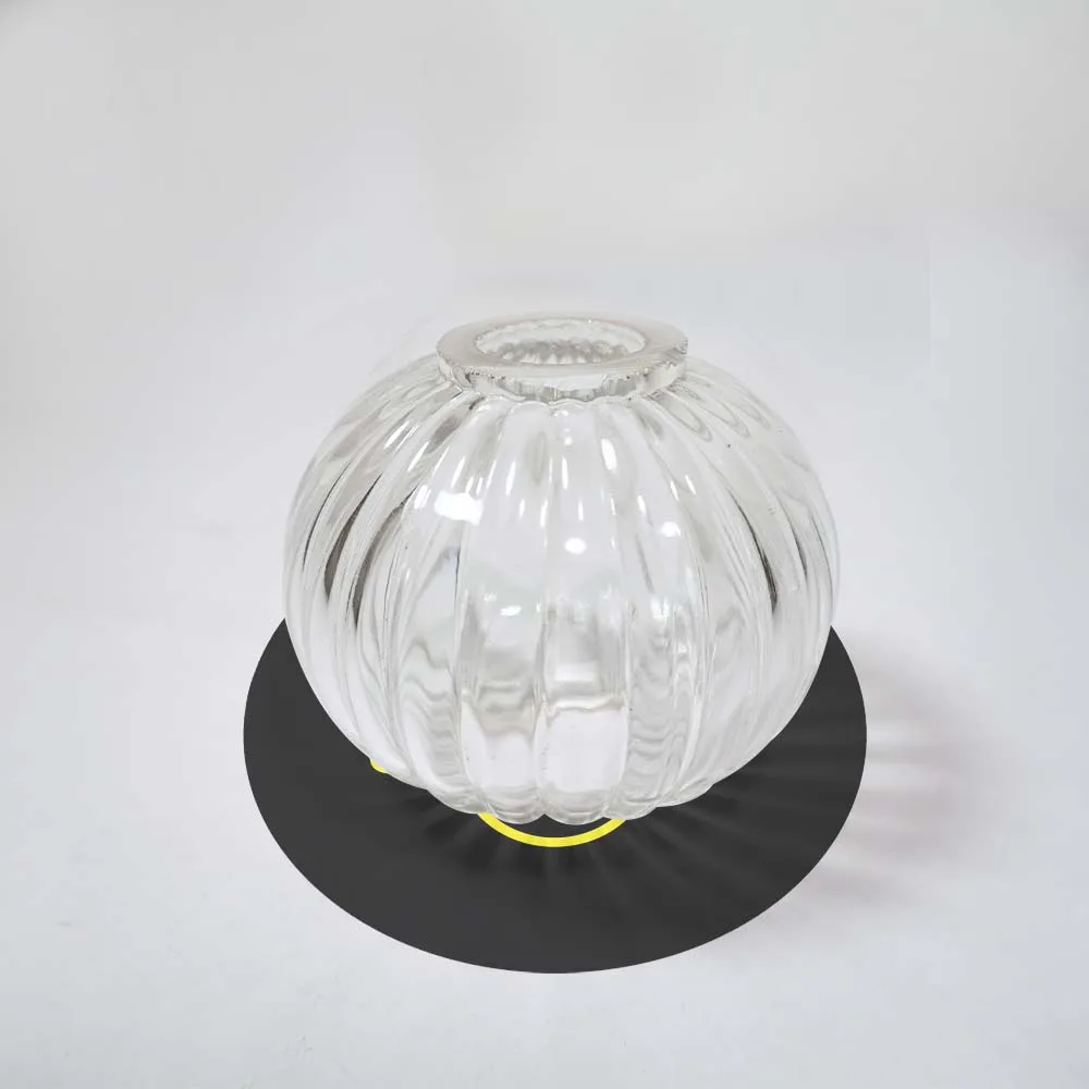 Clear Glass Ball 70mm – Borosilicate Pumpkin Lighting Component 2 Clear mouth-blown glass ball lighting component, angled view
