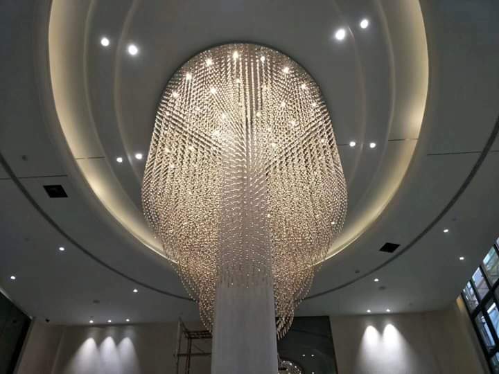 Completed cylindrical crystal chandelier around the central pillar at Grand Howrah Banquets Kolkata
