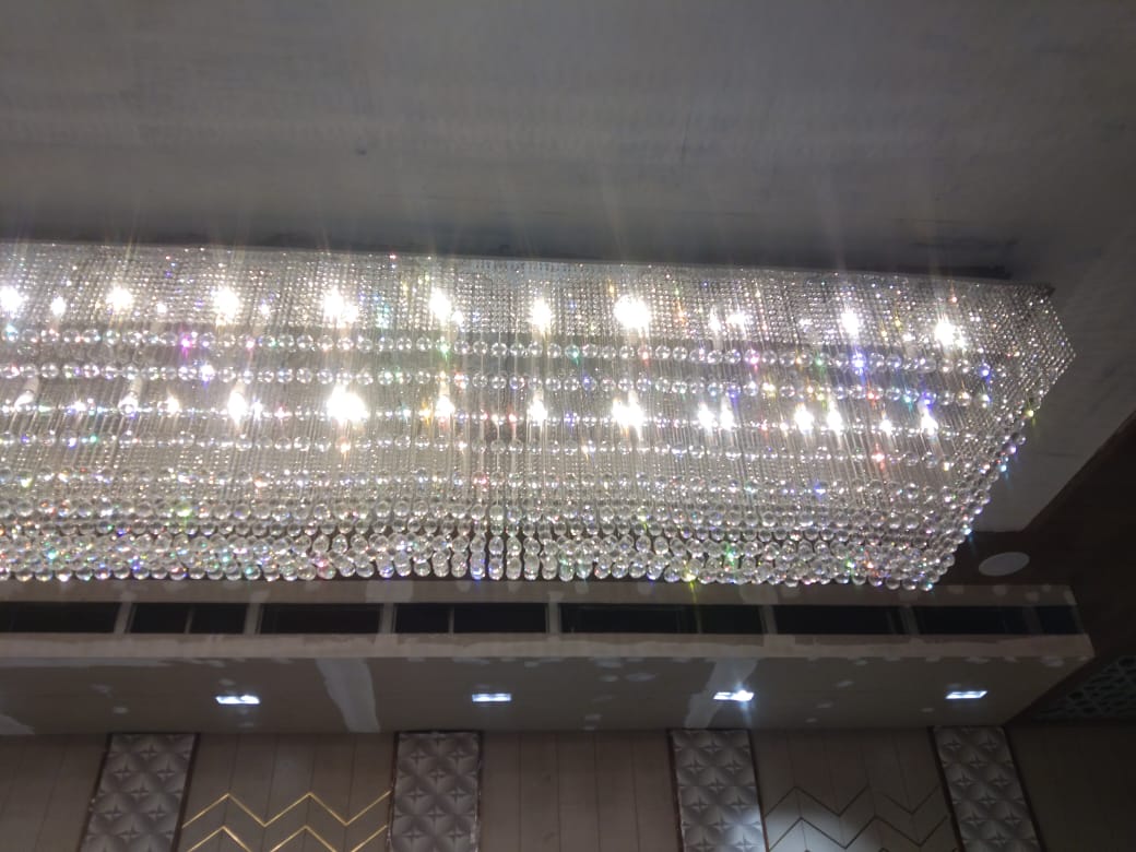 Large 24-foot style crystal chandelier reference from the Pune banquet project