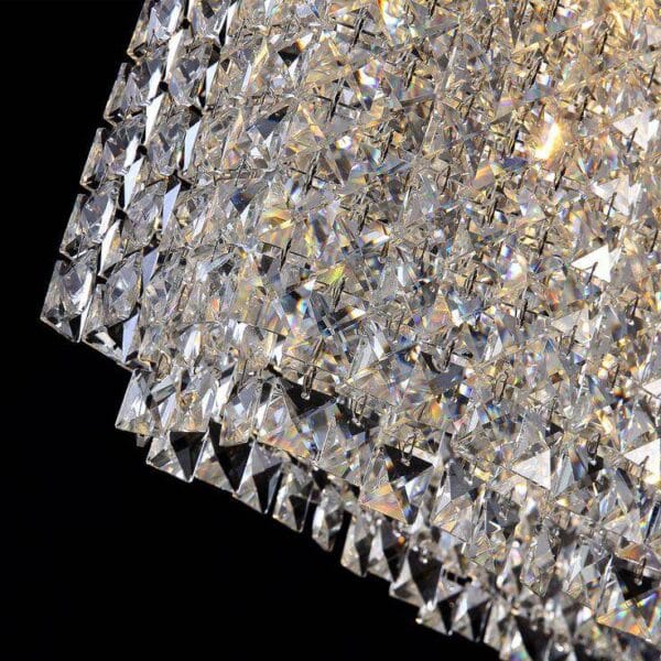 Close-up of the oval crystal chandelier: faceted K9 crystal squares linked on stainless steel pins