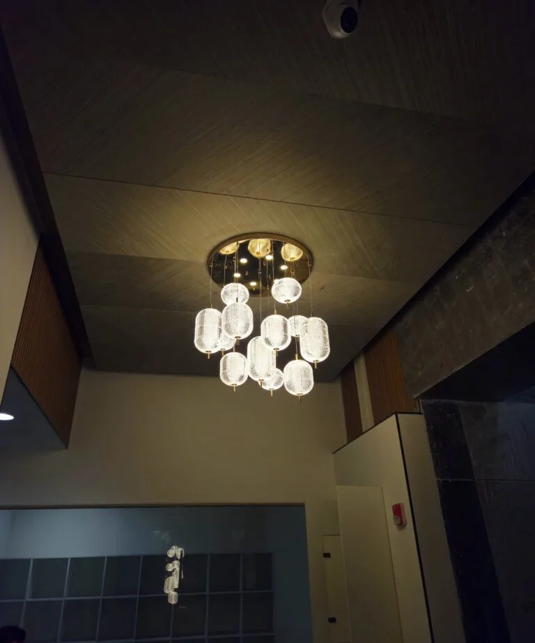 Acrylic 3-in-1 LED commercial chandelier cluster in the Ace Capitol lift lobby