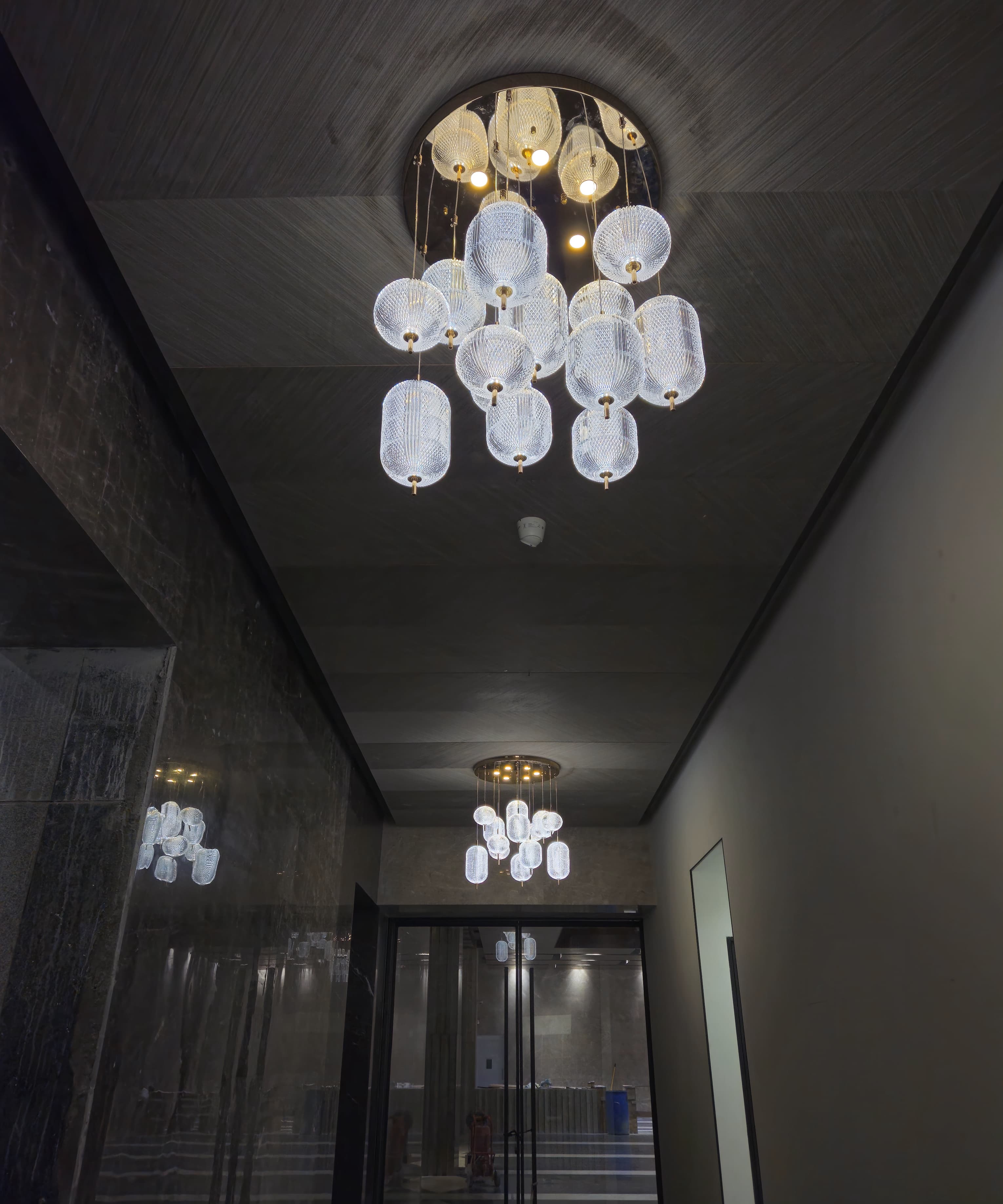 Commercial acrylic chandelier at Ace Capitol lobby