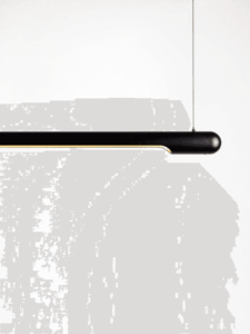 Adjustable linear LED chandelier on steel cables for kitchen island