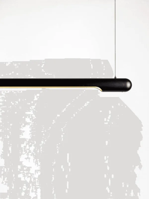 Adjustable linear LED chandelier on steel cables for kitchen island