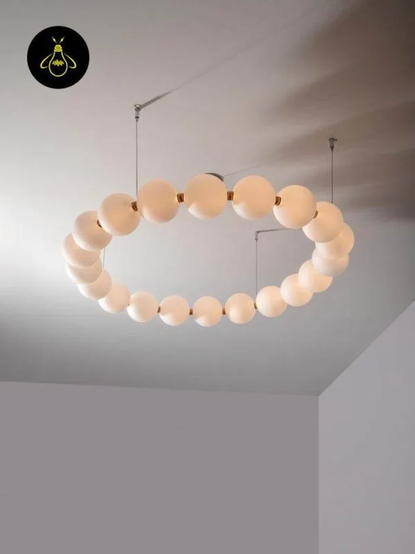 Adjustable-height pearl chandelier with hand-blown opal borosilicate glass globes on steel cables