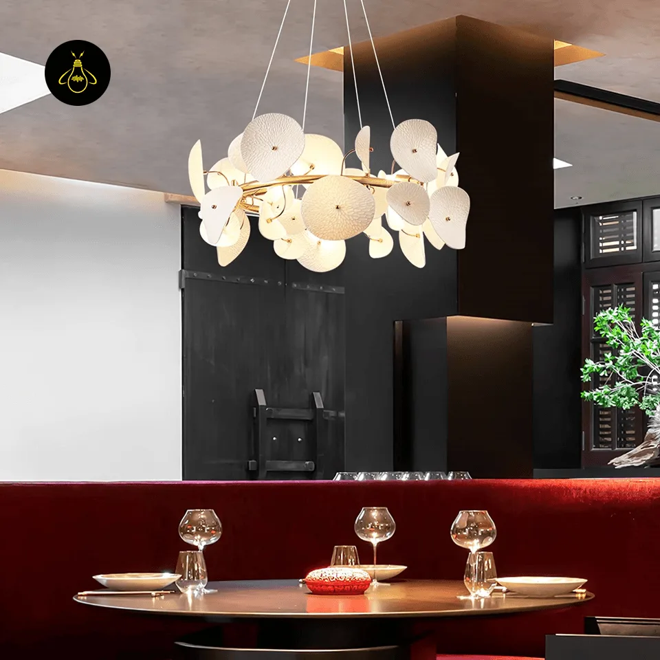 Lotus Chandelier – 80 cm White Ceramic Petal Ring for Living & Dining Rooms 3 Lotus petal chandelier over a round dining table in a modern restaurant