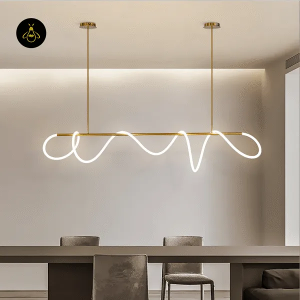 Adjustable height feature of the gold linear LED chandelier