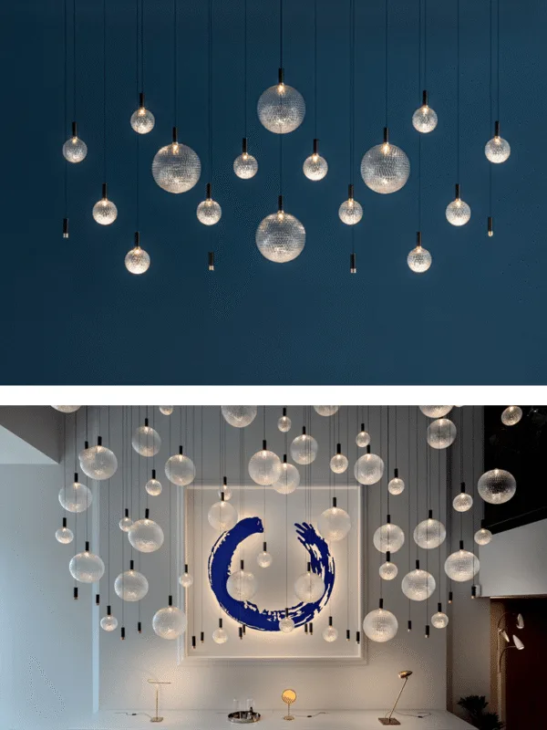 Artistic glass sphere chandelier with a cascading cluster of clear borosilicate glass balls for luxury homes