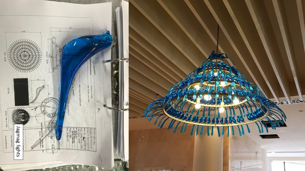Golden ring chandelier composition with blue glass bird details for the Hyatt Regency project