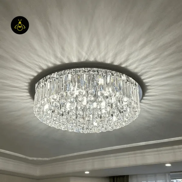 Chrome crystal flush-mount ceiling chandelier with clear crystal dome in a living room