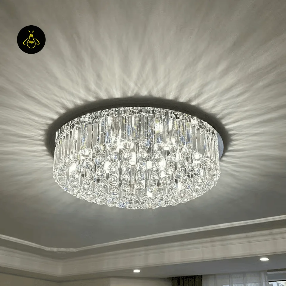 Crystal Ceiling Chandelier – Round Flush-Mount K9, 6 Sizes 7 Chrome crystal flush-mount ceiling chandelier with clear crystal dome in a living room