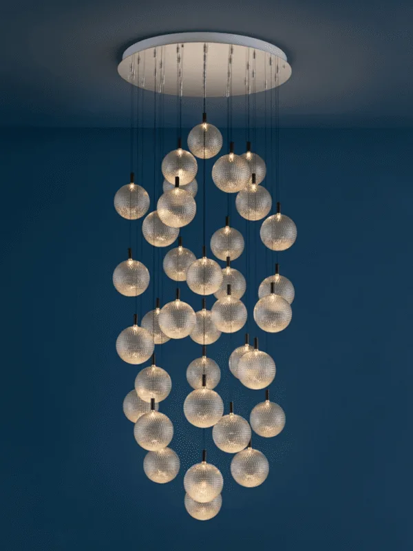 Glass sphere chandelier with clear textured-glass balls in a modern interior