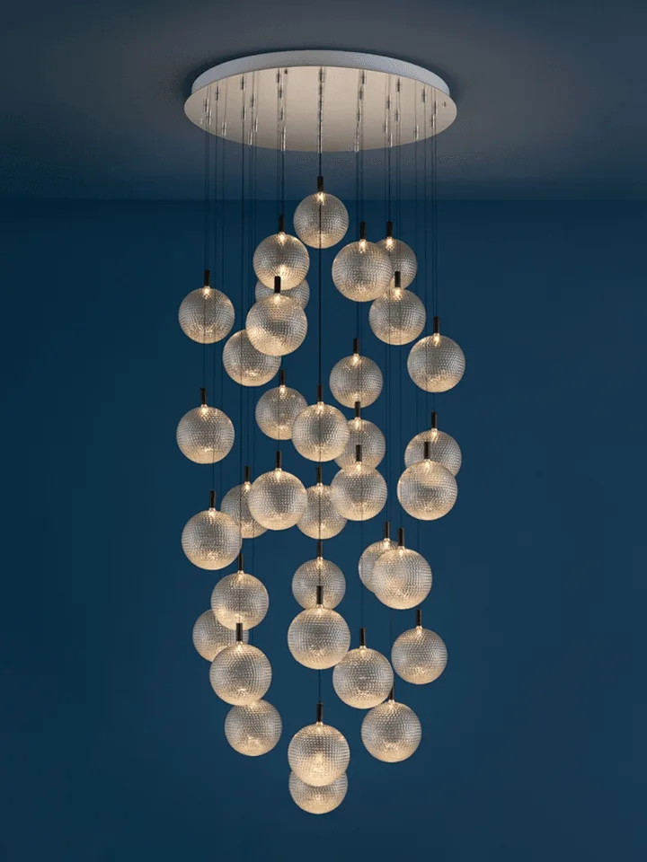Glass sphere chandelier with clear textured-glass balls in a modern interior