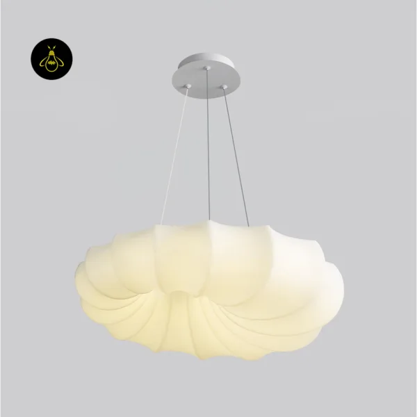 Cloud hanging light switched on against a grey wall – white fabric pendant with ruffled lobes and white canopy