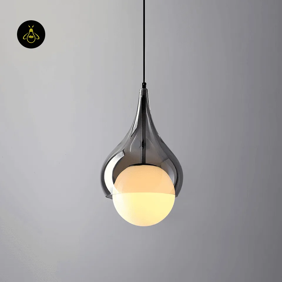 Smoked Glass Teardrop Pendant Light – 20 cm Hanging Bedside Light with Opal Globe 3 Hanging bedside light lit up, opal borosilicate glass globe glowing in the mouth of the smoked glass teardrop