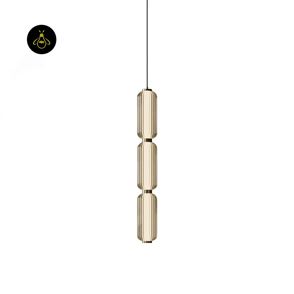 Linear Glass Pendant Light – Ribbed Gold Cylinder, 3 Sizes (31–94 cm) 2 Ribbed gold-glass linear pendant light close-up of three stacked glass barrels