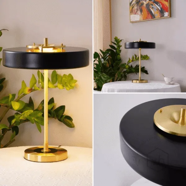Polished gold stem and disc shade of the retro study lamp in a study corner