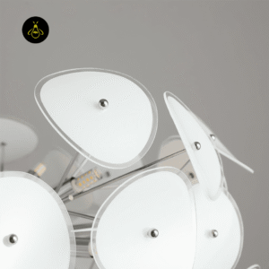 Close-up of the white frosted glass petals on the chandelier's chrome arms