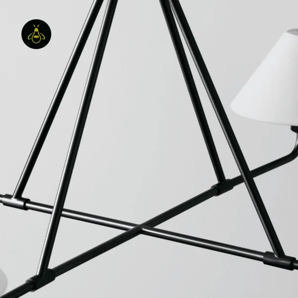 Close-up of a white fabric shade softly diffusing light on the black chandelier