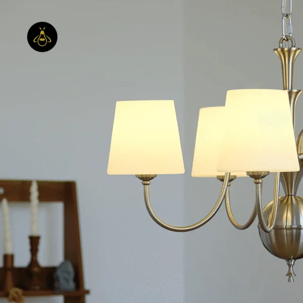 Close-up of vintage shabby-chic detailing on the white fabric chandelier
