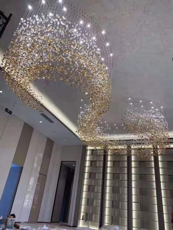 Contemporary suspended ceiling lights installed at The Grand Aura Hotel Jammu