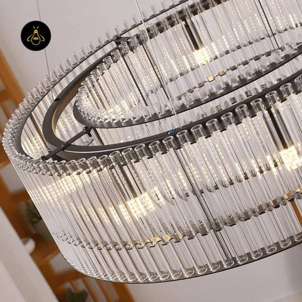 Close-up of the clear ribbed acrylic rods and black frame on a modern ring chandelier
