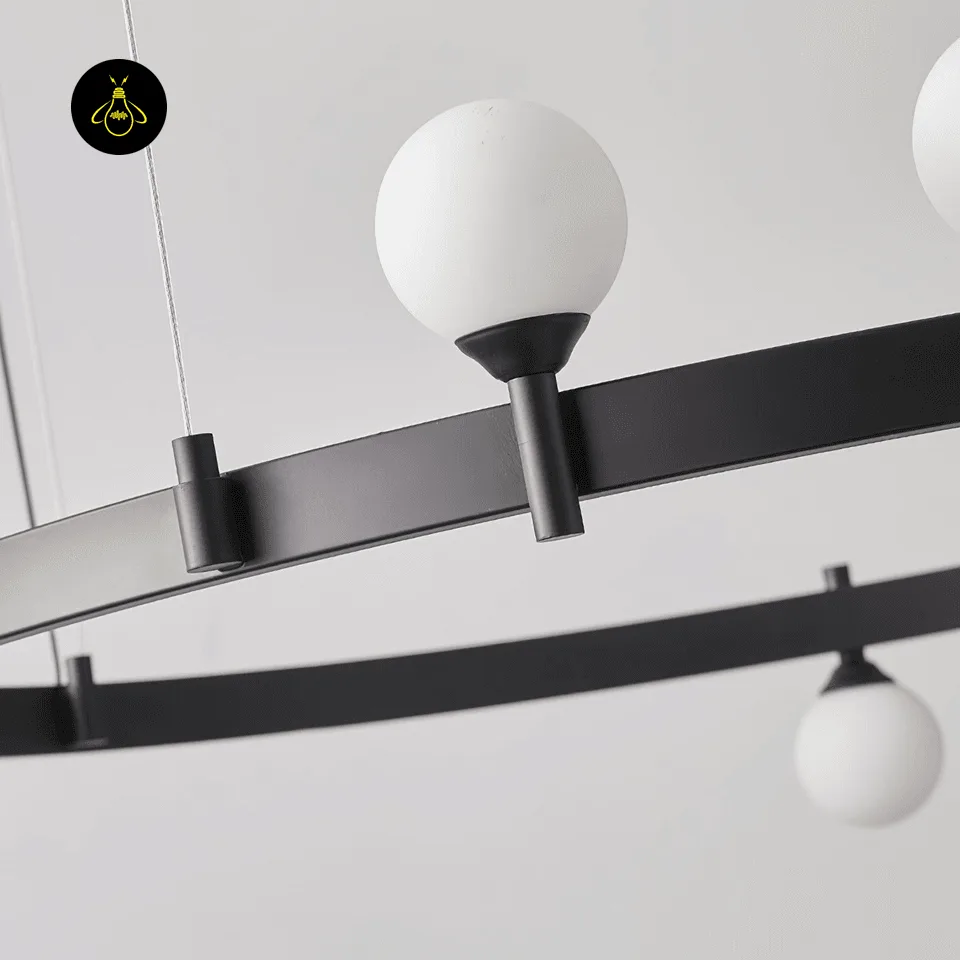 Modern Glass Chandelier – 6-Globe Black Ring, 82 cm Diameter 3 Matte-black stainless steel ring and glass globe sockets of a modern glass chandelier
