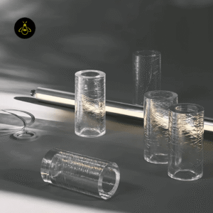 Chrome stainless steel end caps and clear glass segments of the linear glass chandelier