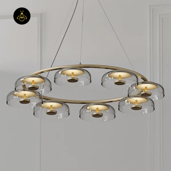 Detail of the brass disc and integrated LED of the glass dome chandelier