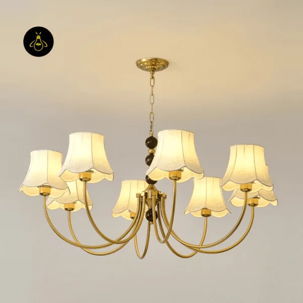 Gold and walnut wood fabric shade chandelier with curved arms on a living room ceiling