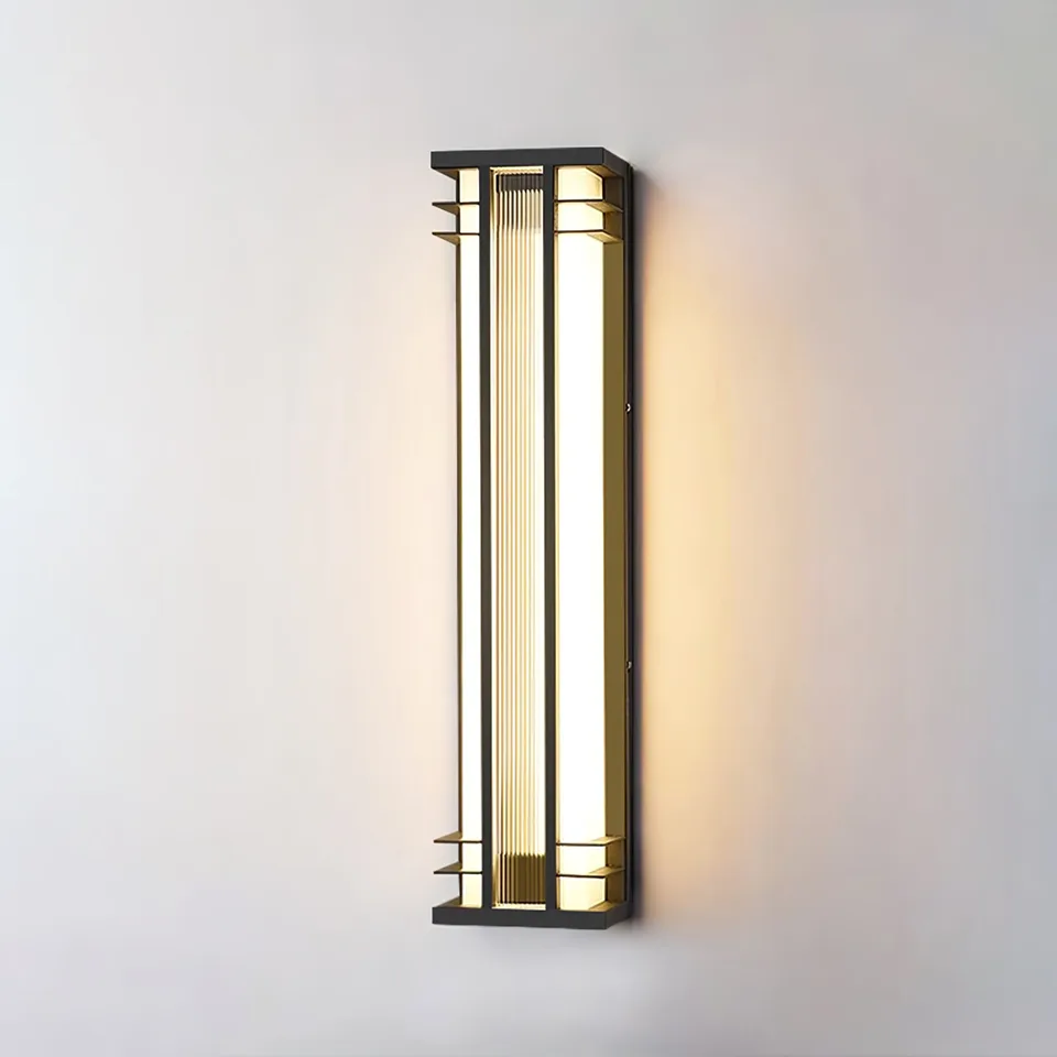 Outdoor Wall Sconce – 70 cm Tall Black & Brass IP65 LED Light 5 Integrated warm-white LED outdoor wall sconce glowing on an exterior wall