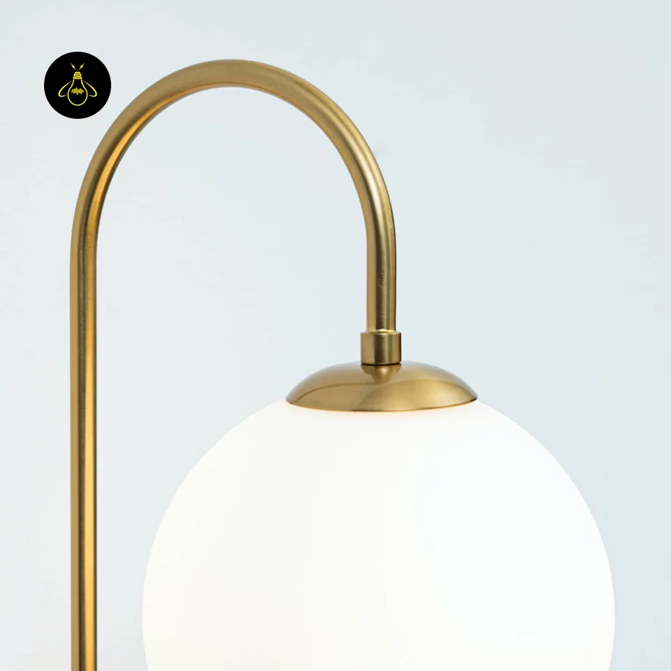 Oriol Frosted Glass Globe Wall Sconce – 48 cm Antique Gold Arch | Jagmag Lights 5 Gold wall light close-up showing the G9 fitting and opal borosilicate glass globe