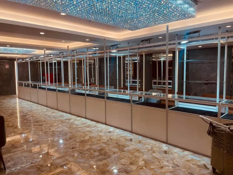 Ice-blue crystal ceiling chandeliers above the live food counters at Tunight Restro and Banquet, Ghaziabad