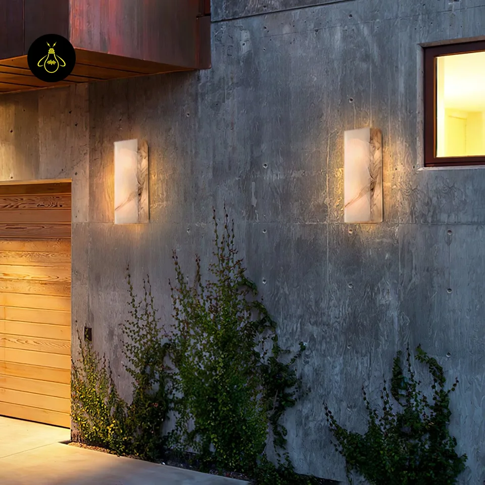 Alabaster Outdoor Wall Light – 65 cm IP65 Stone Sconce 4 Pair of alabaster outdoor wall lights on a concrete facade lighting an entrance at dusk