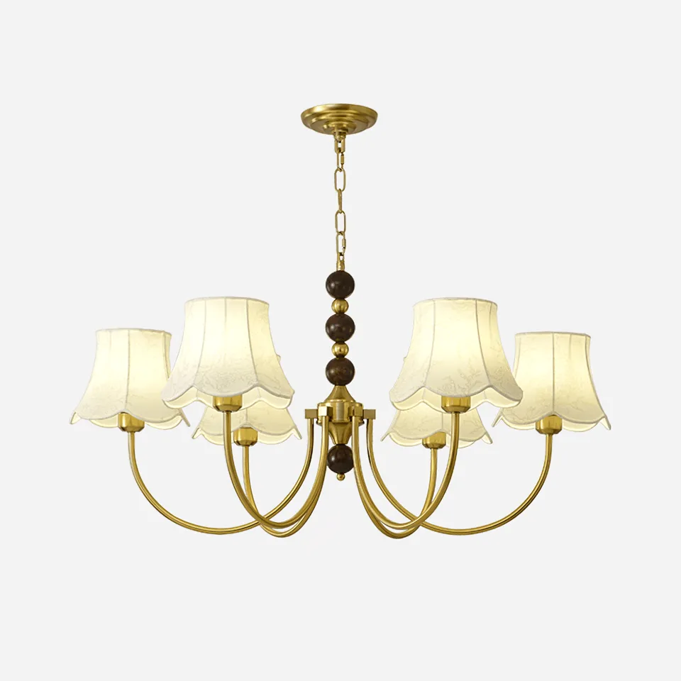 Fabric shade chandelier in gold with six ivory bell-shaped fabric shades for the living room