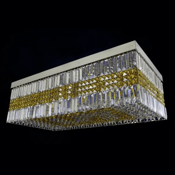 Rectangular crystal ceiling light — gold tiered flush-mount crystal fixture with warm bulbs