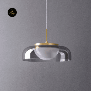 Smoky grey glass disc shade on a gold smoky glass pendant light