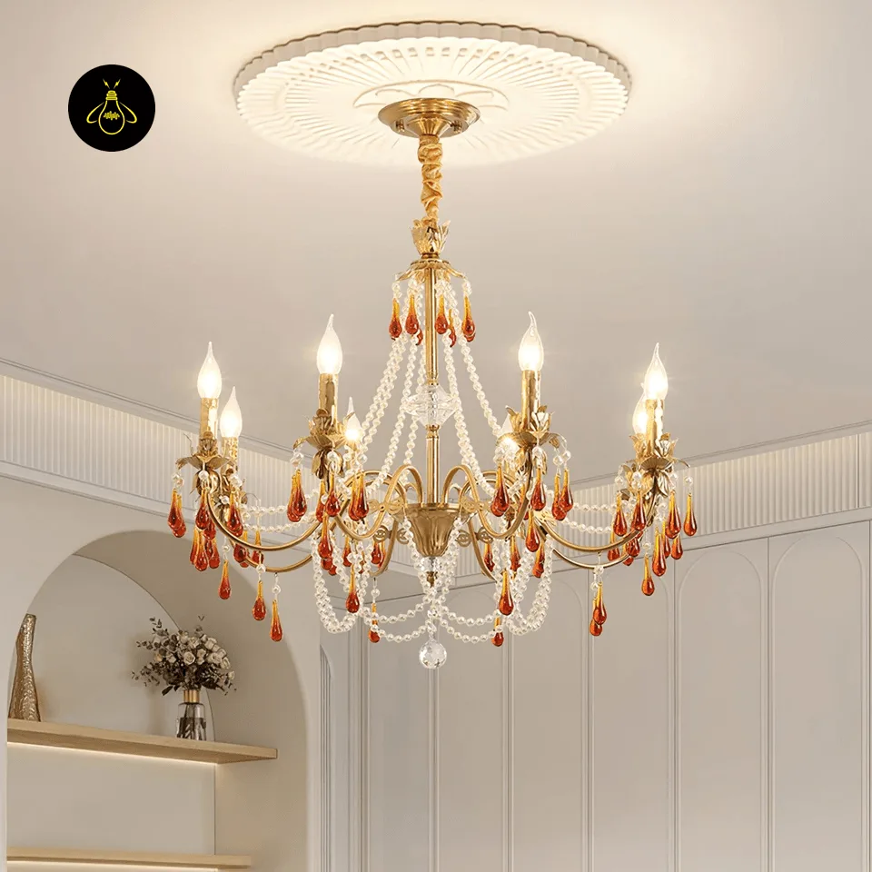 Amber Crystal Chandelier – Gold 80 cm Candelabra Centrepiece 5 Amber crystal chandelier glowing warm in a modern living room