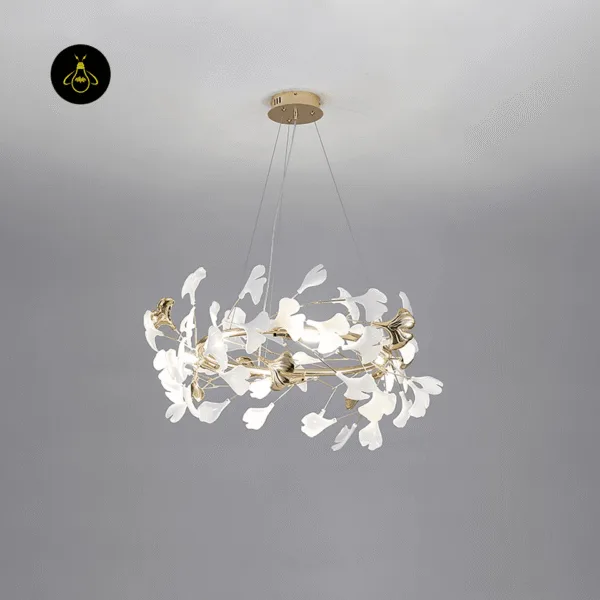 Gold and white finish of a ceramic ginkgo leaf chandelier