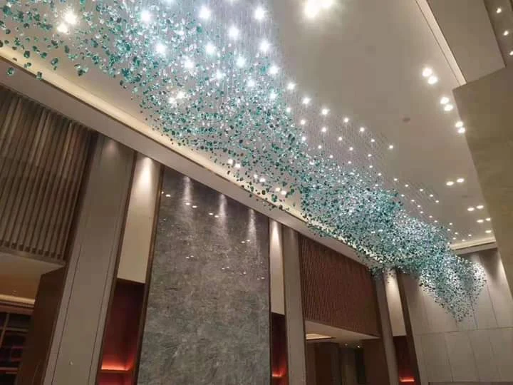 Hotel lobby ceiling lighting installation at The Grand Aura Hotel Jammu