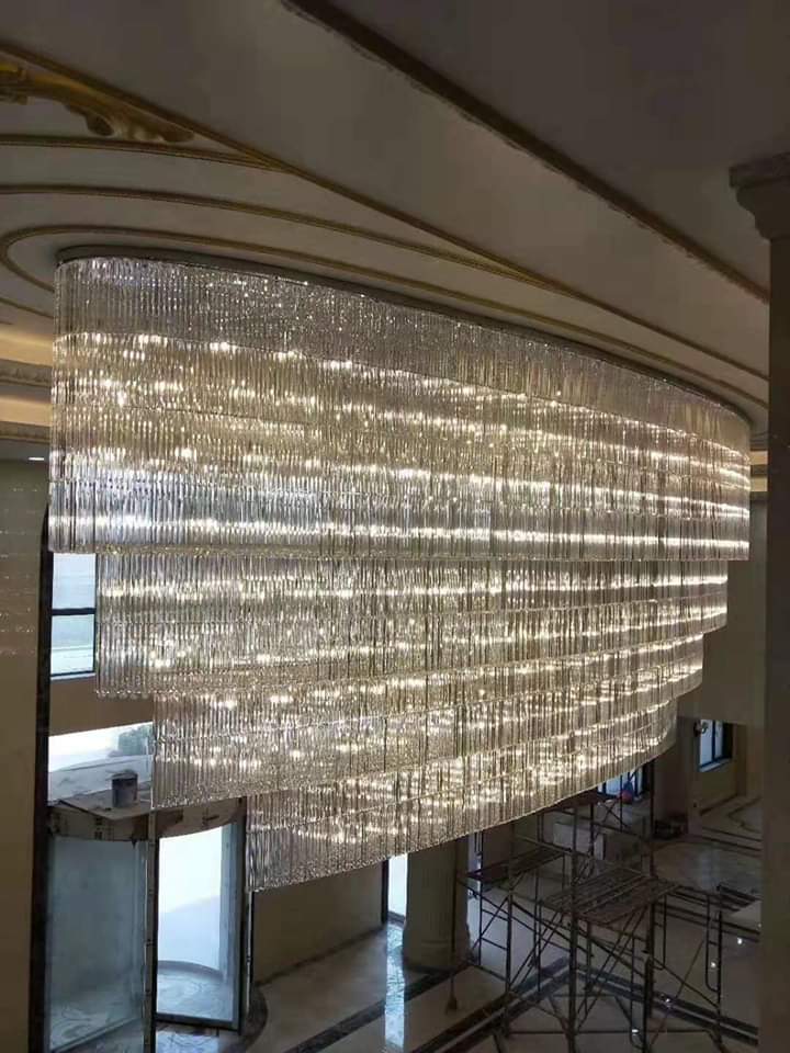 Side view of the Rajmahal Jaipur lobby chandelier showing layered crystal curtain drops