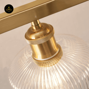 Ribbed glass shade and brass fitting detail
