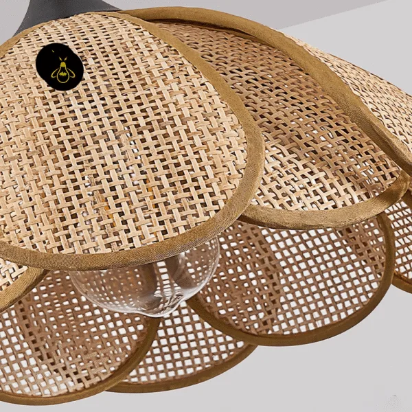 Close-up of the woven cane petals of the rattan flower pendant light, edges bound in olive-brown trim